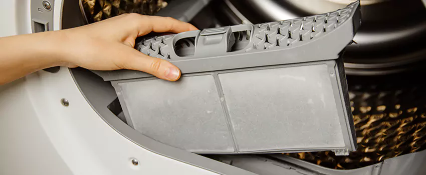 Signs Of A Clogged Dryer Lint Trap in Waverly, Michigan